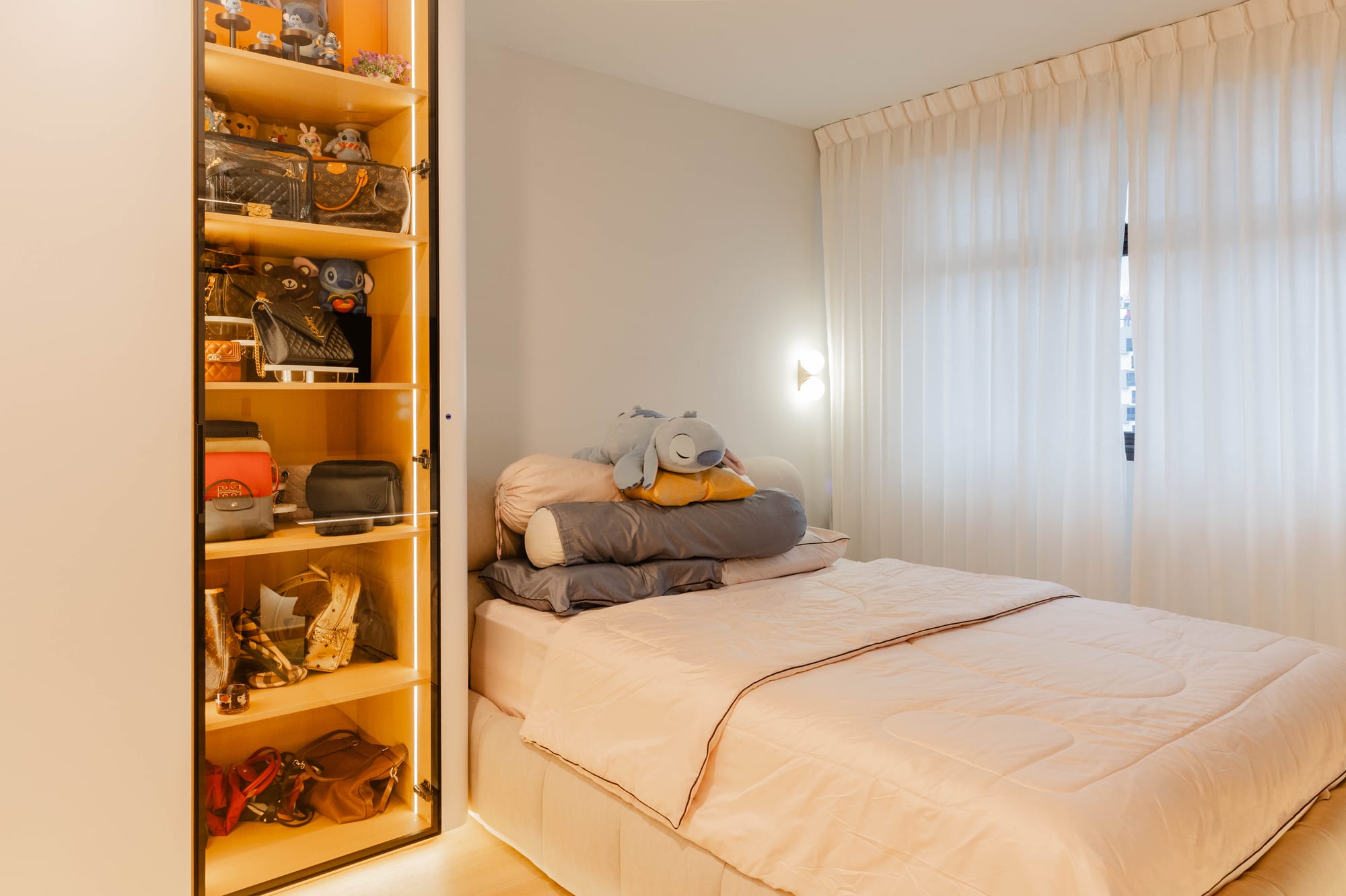 Bedroom display cabinet with warm backlighting