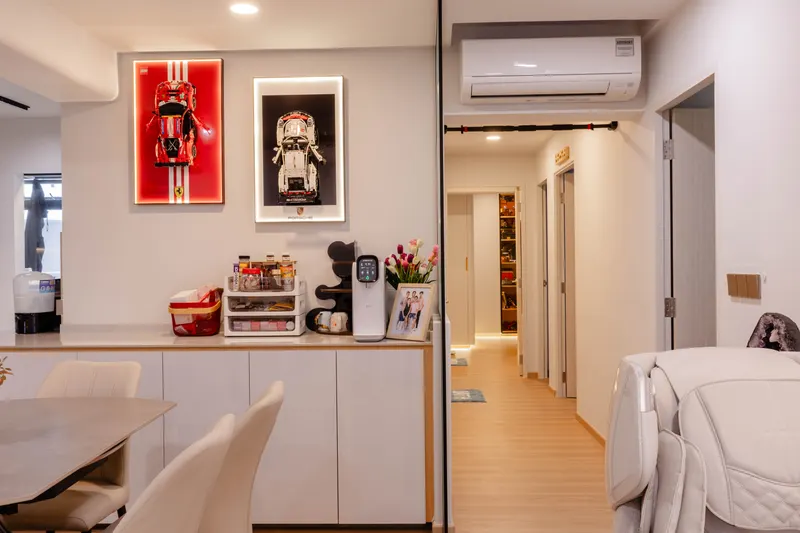 Dining and kitchen with car artwork