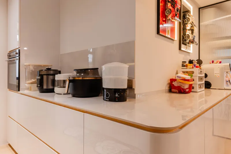 Countertop appliances in the white kitchen