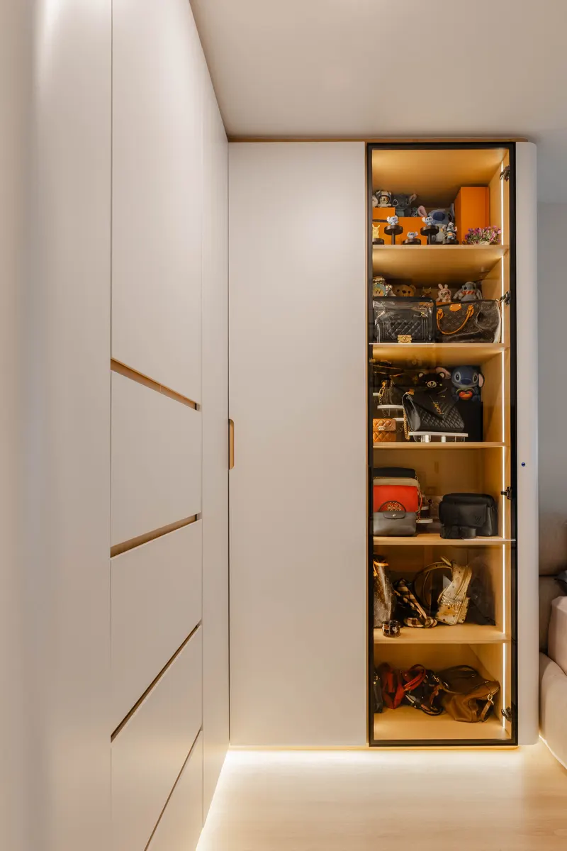 Wardrobe door detail with brass trim